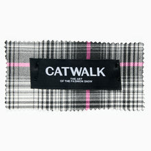 Load image into Gallery viewer, Catwalk woven label detail showing typography on black fabric