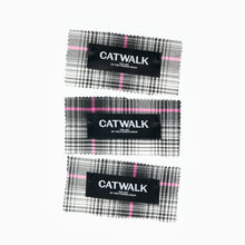 Load image into Gallery viewer, Multiple Catwalk woven labels pinned onto V&A Dundee tartan fabric swatches
