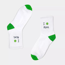 Load image into Gallery viewer, White socks with green accents and 'I Pea  PEAS' text on a white background