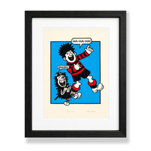 Load image into Gallery viewer, Dennis the Menace and Gnasher laughing Beano screen print by John Reynolds in red, black and blue shown in a black frame with white mount