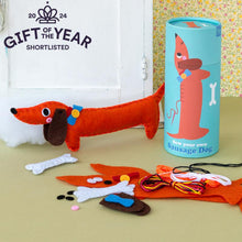 Load image into Gallery viewer, felt dog sewing kit with the contents of the kit and the box packaging