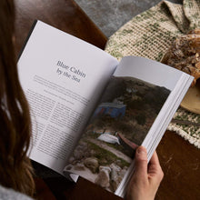 Load image into Gallery viewer, Open Hidden Scotland Spring Summer issue 12 magazine article titled 'Blue Cabin by the Sea' with a plate of food on a table.