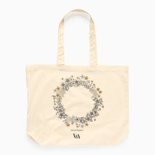 Load image into Gallery viewer, Johanna Basford Wildflower Ring tote bag in beige featuring a floral illustration from Wonderful Wildflowers colouring book.