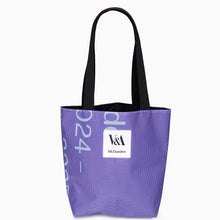 Load image into Gallery viewer, Upcycled portrait exhibition banner tote bag showing unique purple and blue graphic design