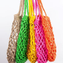 Load image into Gallery viewer, A selection of handcrafted string bags in various colors: beige, green, yellow, orange, and pink, each with a natural twine handle.