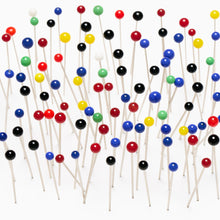 Load image into Gallery viewer, Colourful glass head sewing pins spread out showing multicolour heads