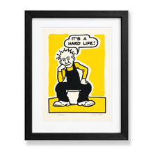Load image into Gallery viewer, Oor Wullie sitting on his bucket limited edition screen print by John Reynolds in yellow and black in black frame with white mount