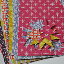 Load image into Gallery viewer, Sheets of double-sided press-out paper stars for making a Cambridge Imprint Christmas garland