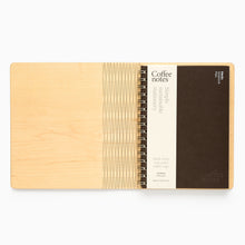 Load image into Gallery viewer, Refillable oak A5 notebook by The Bonny Company opened to show Coffee Notes recycled paper refill made from coffee cups.