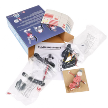 Load image into Gallery viewer, Unassembled robot kit with components and packaging on a white background