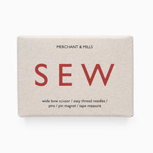 Load image into Gallery viewer, Box of sewing supplies with 'SEW' text and Merchant & Mills branding on a white background