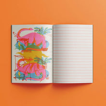 Load image into Gallery viewer, Open Shuffle recycled notebook showing a printed page and lined writing page