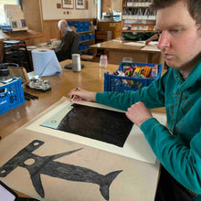 Load image into Gallery viewer, Artist Struan Haswell drawing the hammerhead shark illustration