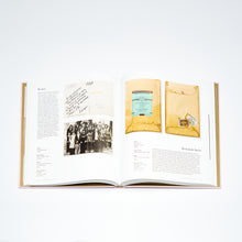 Load image into Gallery viewer, Double page spread from The Fashion Show book featuring fashion show history and imagery