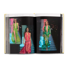 Load image into Gallery viewer, Open Versace Catwalk book showing colourful Versace fashion designs and iconic collection imagery