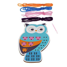 Load image into Gallery viewer, Wooden owl stitch board with four colourful lengths of yarn