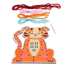 Load image into Gallery viewer, Wooden tiger stitch board with four colourful lengths of yarn
