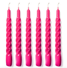 Load image into Gallery viewer, Set of six pink twisted candles on a white background