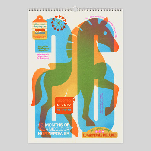 Colourful horse-shaped calendar with text on a gray background