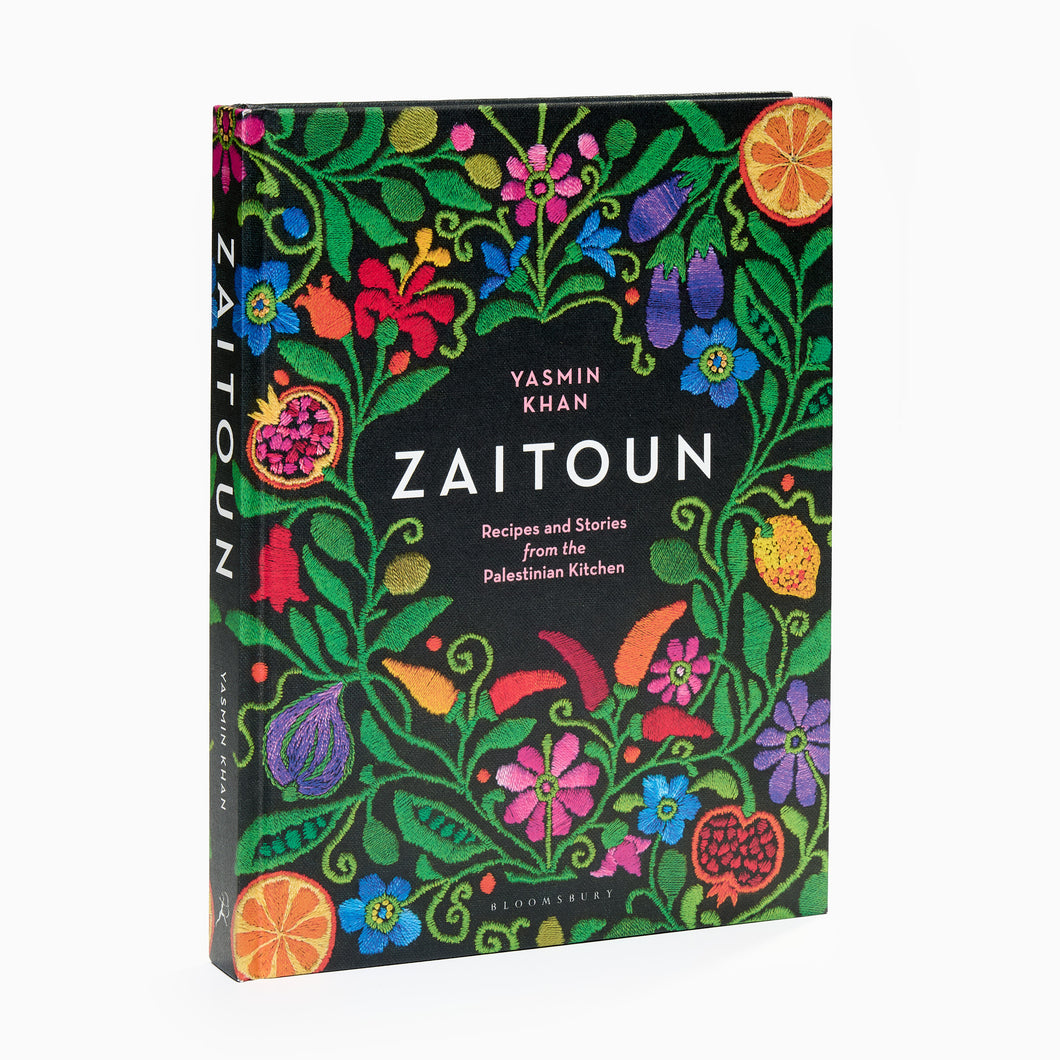Book titled 'Zaitoun' with colorful floral design on a black background