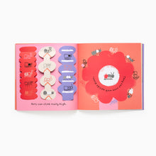 Load image into Gallery viewer, Children's book with colourful pop up lift the flap illustrations on a white background
