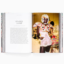 Load image into Gallery viewer, Interior pages of Alexander McQueen Unseen book showing backstage fashion photography
