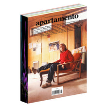 Load image into Gallery viewer, Magazine titled 'apartamento' issue 37 with a person sitting on a chair in a room.
