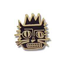 Load image into Gallery viewer, Gold and black face-shaped pin on a white background
