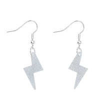 Load image into Gallery viewer, Silver Dust Lightening Bolt Charm Earrings by Tatty Devine
