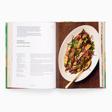 Load image into Gallery viewer, Open cookbook showing a plate of food with text on a white background
