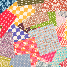Load image into Gallery viewer, Colourful Cambridge Imprint patterned papers included in the Garland of Stars Origami Kit
