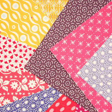 Load image into Gallery viewer, Close-up of Cambridge Imprint patterned paper stars in pink, yellow, purple and red designs
