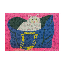 Load image into Gallery viewer, Jigsaw puzzle with a cartoon character in a blue bag on a pink background
