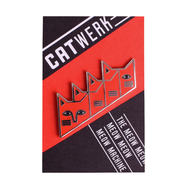 Cat-shaped enamel pin on a red and black card with 'CATWERK' branding.