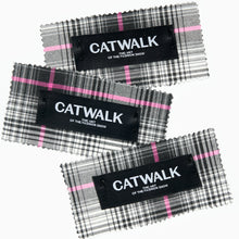 Load image into Gallery viewer, Catwalk woven label with black and white text pinned to V&amp;A Dundee tartan fabric

