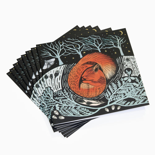 Stack of notebooks with squirrel illustration on black cover