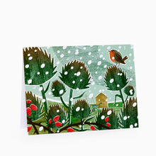 Load image into Gallery viewer, charity christmas card with red robin illustrative outdoor scene with green trees and red berries
