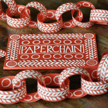 Load image into Gallery viewer, Finished Cambridge Imprint Christmas paper chain made from patterned red and cream paper loops
