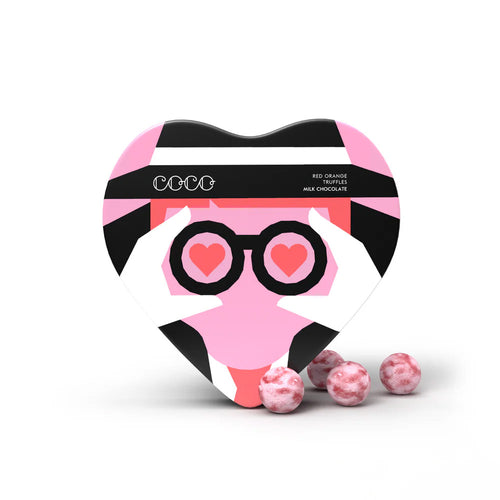 Heart-shaped chocolate box with panda design and pink candies on a white background