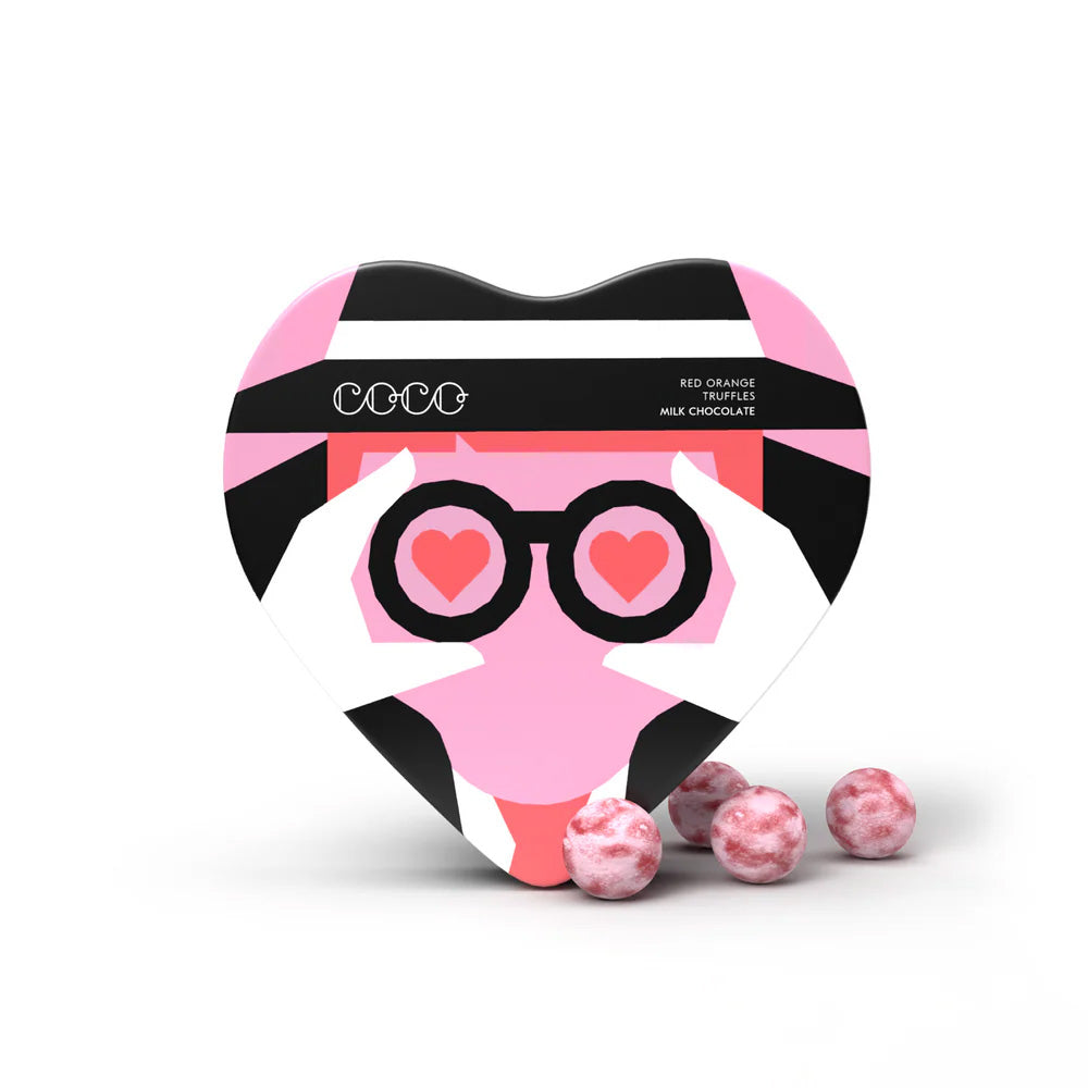 Heart-shaped chocolate box with panda design and pink candies on a white background