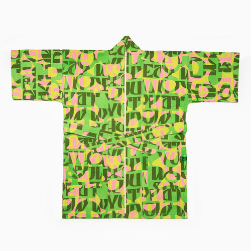 colourful patterned kimono-style robe in green, yellow and pink abstract pattern.  