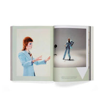 Load image into Gallery viewer, Open David Bowie Is Inside book showing Bowie and a stage costume
