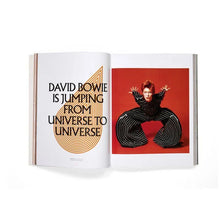 Load image into Gallery viewer, Open David Bowie exhibition book featuring performance photography and artwork
