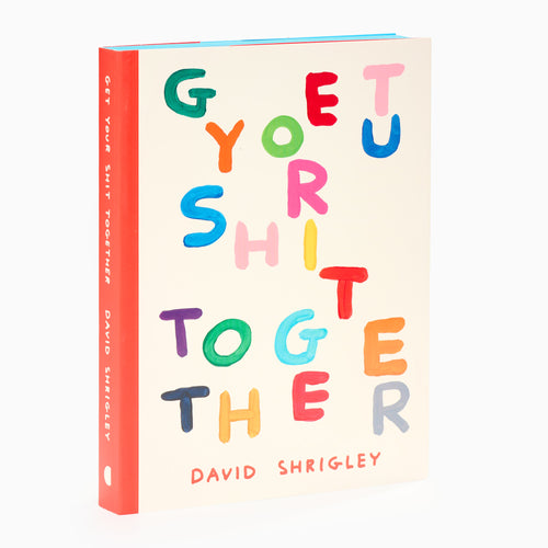 Book cover with colorful text and a red spine on a white background