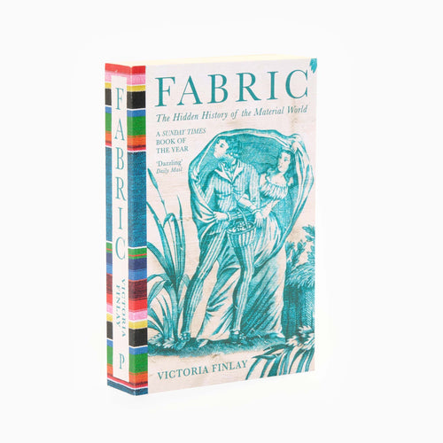 A book titled 'Fabric: The Hidden History of the Material World' by Victoria Finlay, featuring a colorful illustrated cover with blue, green, and white tones.