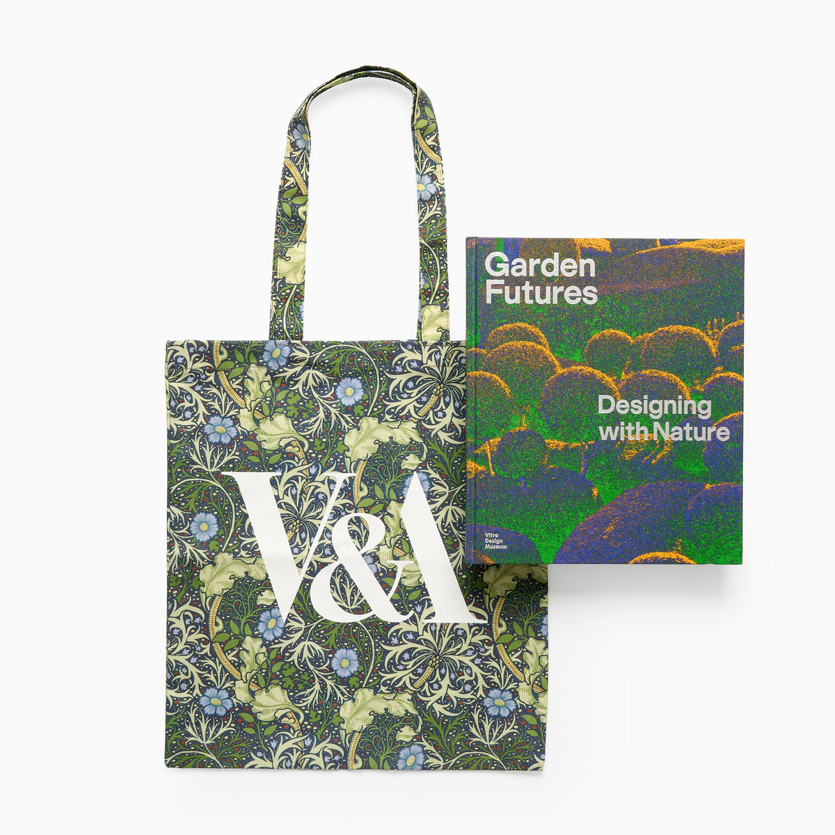Tote bag with floral design and V&A logo next to a book titled 'Garden Futures: Designing with Nature' on a white background