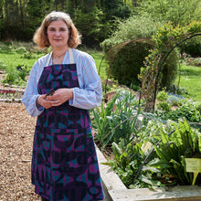 Load image into Gallery viewer, contemporary gardening apron on female gardener by irregular sleep pattern purple and blue v&amp;a dundee
