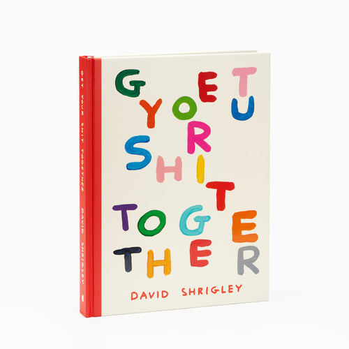 The cover of the book 'Get Your Shit Together' by David Shrigley, featuring multicolored letters arranged in the title against a beige background, with the author's name at the bottom.