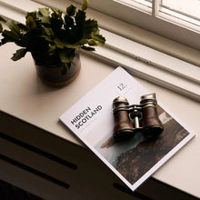 Load image into Gallery viewer, Hidden Scotland Magazine Issue 12 styled with home decor and travel accessories

