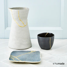 Load image into Gallery viewer, three ceramic vessels repaired using gold kintsugi repair kit

